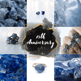 Raw blue sapphire gemstones and sterling silver jewelry including rings, necklaces, bracelets and earrings